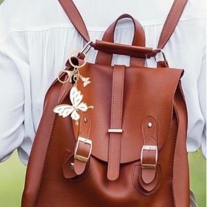 NIP Gold & White butterfly bag charm/keychain 🦋